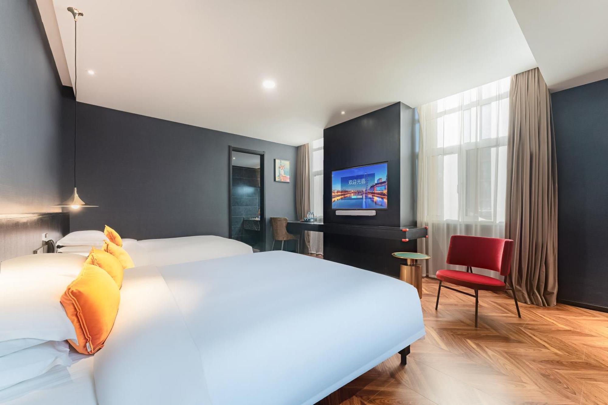 Hesu Designer Hotel & Suites -Near Xi'An Drum Tower And Yongning Gate -Free Laundry Luggage Storage -Kitty Cafe With Freshly Ground Coffee -24H Front Desk -English Service Exterior photo