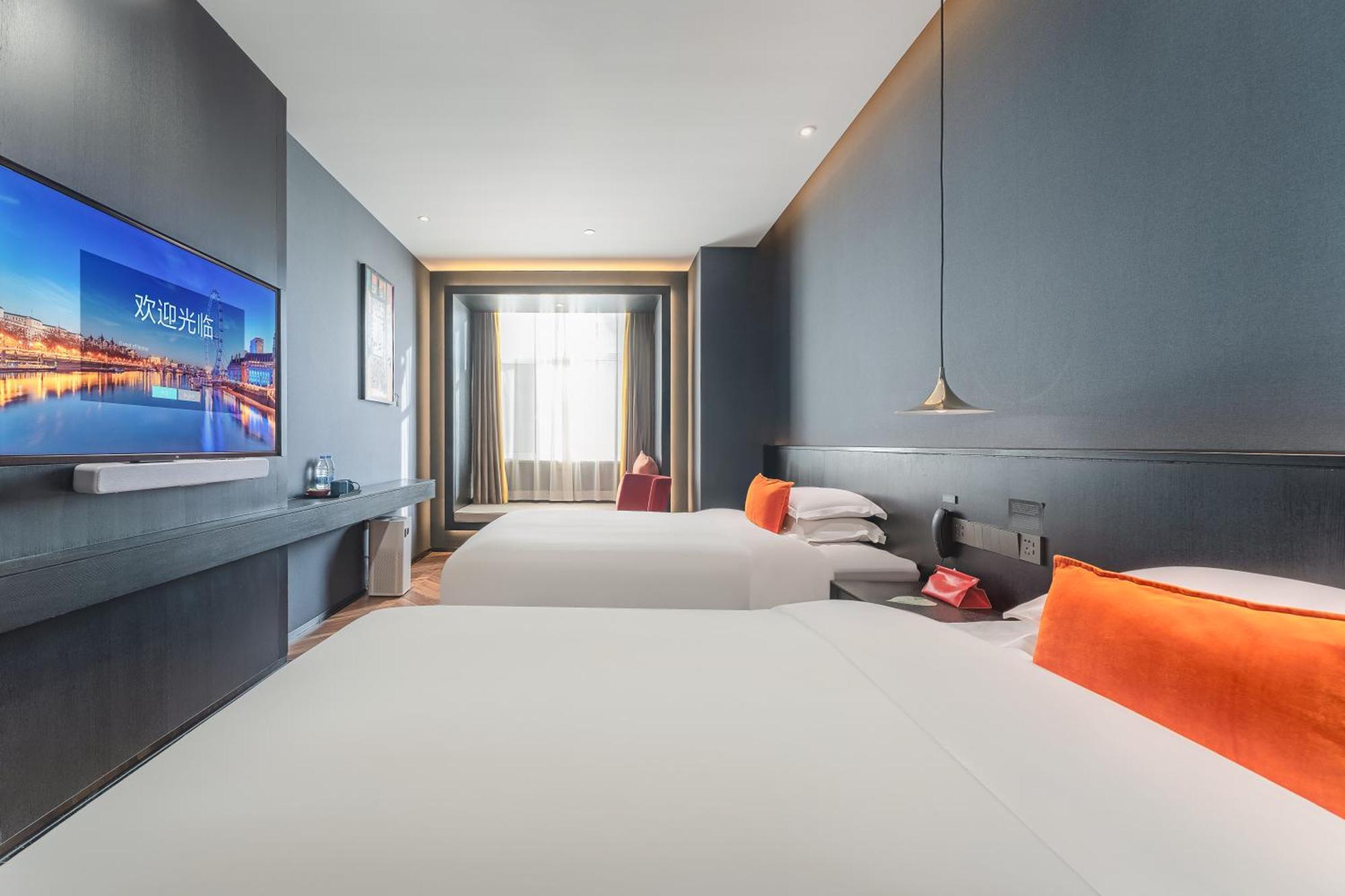 Hesu Designer Hotel & Suites -Near Xi'An Drum Tower And Yongning Gate -Free Laundry Luggage Storage -Kitty Cafe With Freshly Ground Coffee -24H Front Desk -English Service Exterior photo